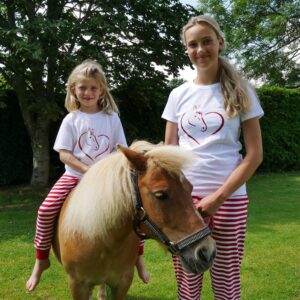 Our fun stripey horse pyjama set bottoms are topped with a cotton top printed with a pretty horse in a heart-shape. Add a name to make them extra special