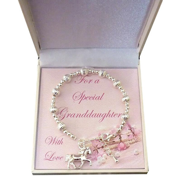 Girls Pony Charm Bracelet For the girl who loves her horse. Supplied in a lovely white gift box with gift card for you to personalise with your own special message.