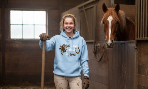 Mucking out at the stables can be dirty work. It's all part of being around horses. We celebrate the mud with this horsey Hoodie